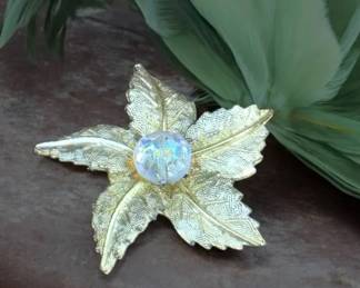 Vintage Flower Brooch with Textured Petals and Aurora Borealis Center Faceted Ball