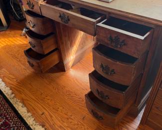 9 drawer wood desk 42”w 21”d 30”t