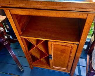 Only $25. Wine cabinet with removable Tray Top. Text Mike 352-281-1822 if you want to buy it.