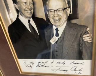 Autographed photo of President Carter, framed with autographed photo of his wife 