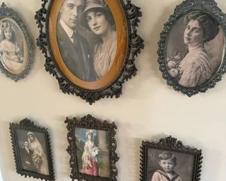 A collection of antique iron frames