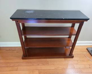 Black Fossiliferous “Marble” Limestone Top Bookcase, 42” Wide, 14” Deep and 34” Tall. 