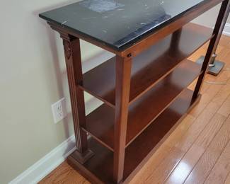 Black Fossiliferous “Marble” Limestone Top Bookcase, 42” Wide, 14” Deep and 34” Tall.