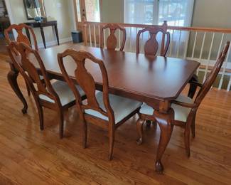 Queen Anne Style Dining room table with 6 chairs 64” Long by 42” wide with one 18” Leaf. Note: Lot 2 is the matching china cabinet.