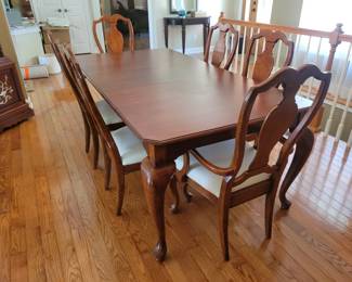 Queen Anne Style Dining room table with 6 chairs 64” Long by 42” wide with one 18” Leaf. Note: Lot 2 is the matching china cabinet.