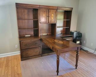 Multi-piece partners desk and hutch collection.