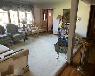 Chairs, antique loveseat and matching chair and collectibles.