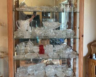 Curio cabinet with crystal and glassware