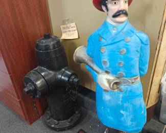 OLD FIRE HYDRANTS AND FIRE MAN