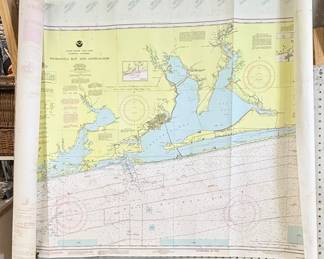 Three large nautical charts