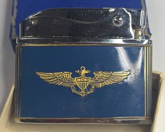 1960s U.S. Navy pilot lighter by penguin