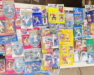 Lots of sports figurines like starting lineup