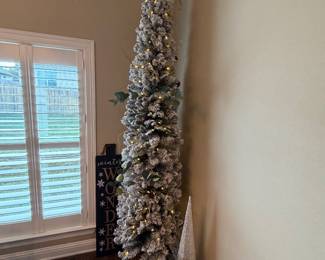 Tall pre-lit Christmas tree