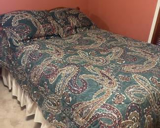 Queen size bed and mattresses.