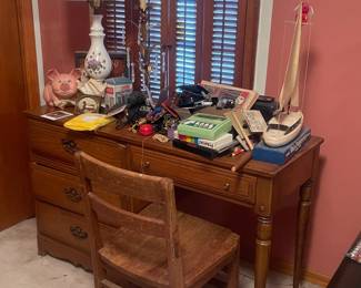 Solid wood desk and chair.
