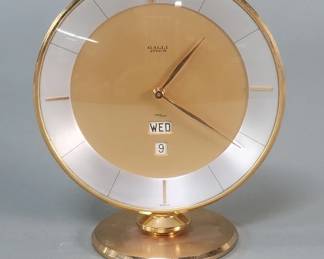 533  Lot 128  Galli Zurich Swiss brass and glass table clock