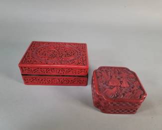 557  Lot 207  Pair of carved cinnabar style red lacquer t