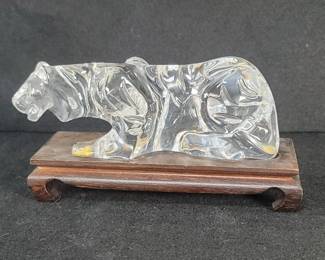 131  Lot 481  Baccarat crystal tiger figure on a wood stand