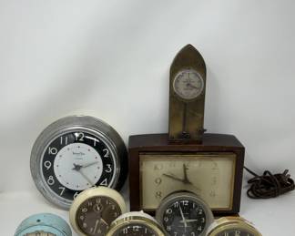 786  Lot 660  Group of vintage alarm clocks with a watch