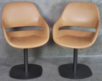 011  Lot 479  Pair of Zanotta Italian leather swivel chairs