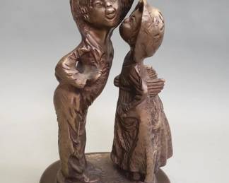 513  Lot 648  Vintage brass boy and girl figurine