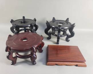 818  Lot 382  Group of Asian wood stands