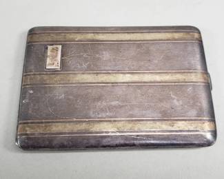048  Lot 679  Art Deco sterling silver cigarette case with 14k