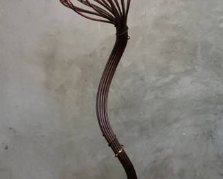 720  Lot 130  Art Nouveaustyle iron floor lamp featuring a