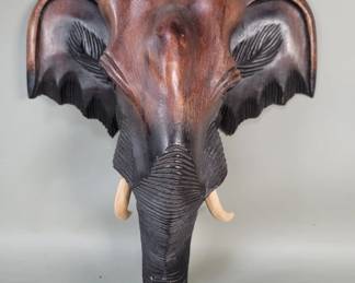 666  Lot 515  Carved wood elephant,s head wall mount