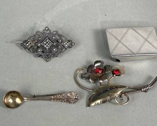 174  Lot 690  Pair of 3 sterling brooches and sterling belt