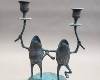 496  Lot 584  Vintage brass frog candleholders