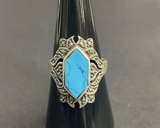 727  Lot 510h  Sterling silver blue stone and marcasite ring