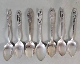 185  Lot 119  Seven sterling silver souvenir spoons