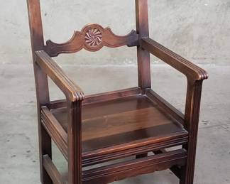 541  Lot 145  Shaw Furniture Co. carved walnut arm chair