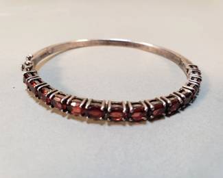 322  Lot 241  Sterling  garnet hinged bracelet
