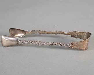 143  Lot 433  Sterling silver tongs