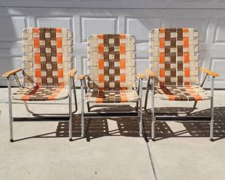 062  Lot 325h  Vintage aluminum woven webbing outdoor chairs