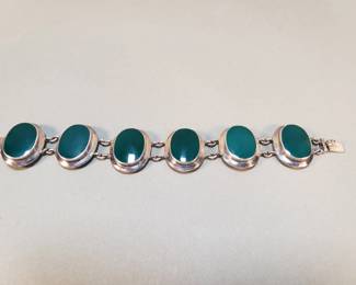 324  Lot 243  Sterling and green glass link bracelet