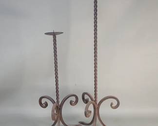 461  Lot 431  A pair of vintage wrought iron candle pickets