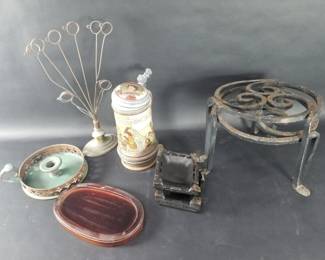 898  Lot 634  Box of miscellaneous iron stands, beer stein,