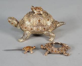 706  Lot 710  Brass tone 3 piece turtle desk set adorned with