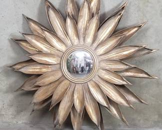 688  Lot 586  Twos Company metal gilt sunflower wall mirror