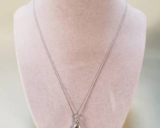 312  Lot 22  Sterling with dancing sapphire and diamond pendant