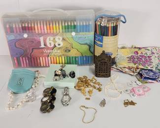 776  Lot 409h  Costume jewelry, Bulova watch, color pencils,
