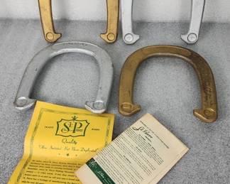 766  Lot 331h  Vintage St Pierre Royal pitching horse shoes