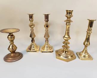 869  Lot 644  Group of brass candlesticks