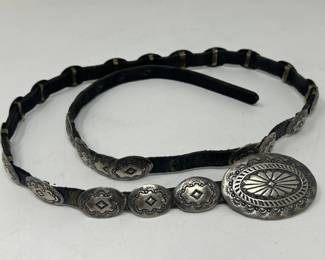 137  Lot 38  Vintage sterling silver, leather and brass belt