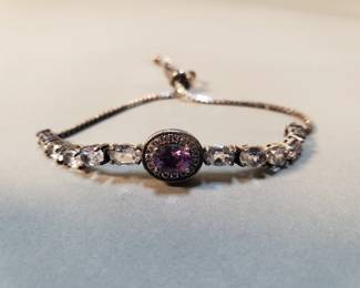 319  Lot 232  Sterling amethyst, diamonds and topaz bracelet