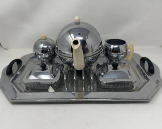 610  Lot 396  Art deco style chrome tea set