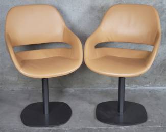 018  Lot 489  Pair of Zanotta Italian leather swivel chairs